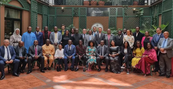 Government officials and social partner representatives of African ILO Member States stand for a group photo during the YES Africa validation meeting in Nairobi.