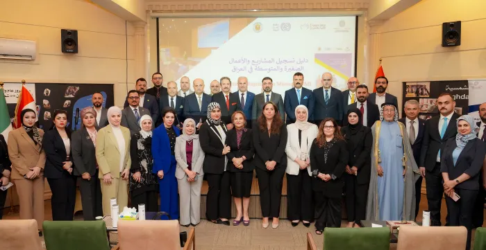 Participants from government, private sector, and international partners gather for a group photo following the launch of the Business Registration Manual. held in Baghdad 2 Sep 2025