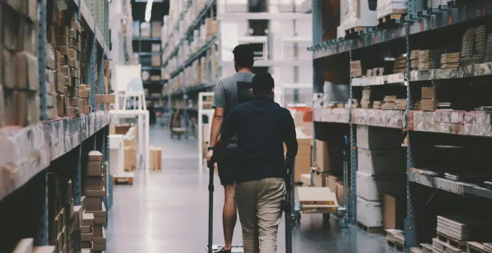 Men Going Around a Warehouse
