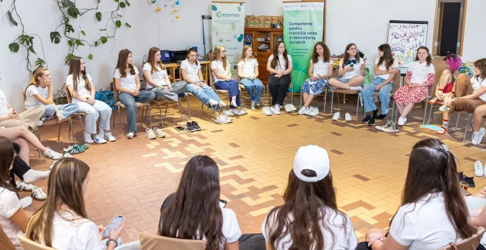Young women sitting in a circle