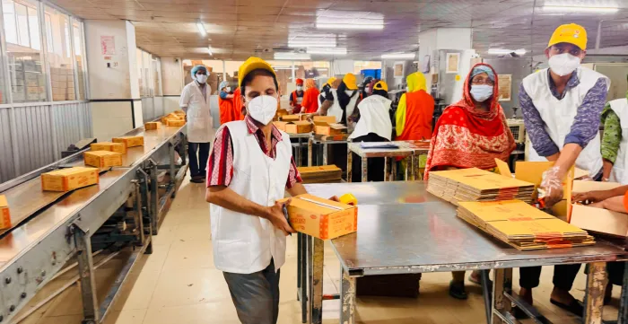 Sunil Das at the production line of Bengal Biscuit factory
