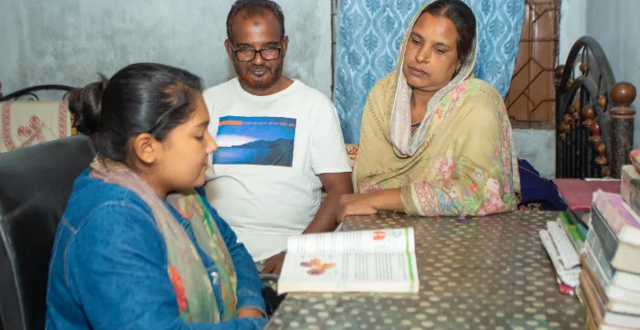 Abdul Mannan with his wife and daughter spending quality time