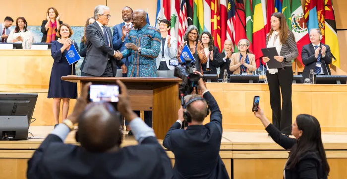 Applause during the closing ceremony of the 114th International Labour Conference as delegates celebrate the adoption of a new convention on decent work in the platform economy.