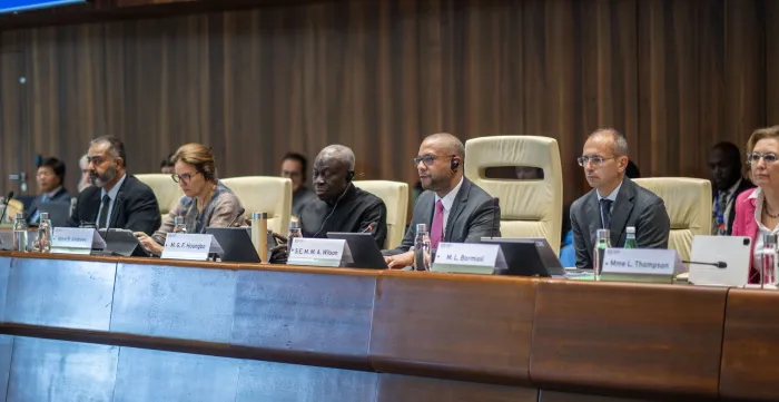 Officials seated at the main stage during the 357th session of the ILO Governing Body.