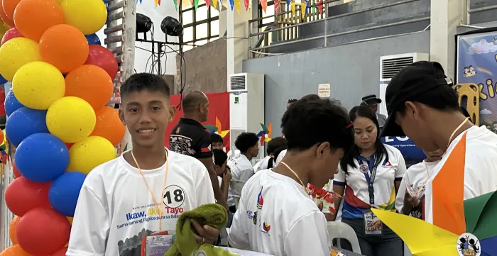 Danilo attends an information and service caravan during the local World Day Against Child Labour in his hometown.