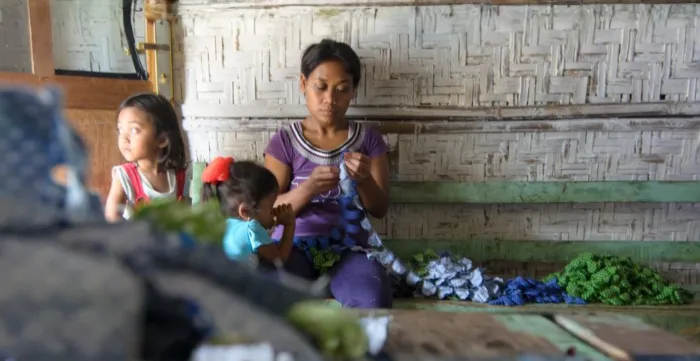 Indonesian woman worker and her families in Malang, East Java.