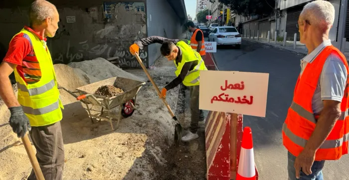 Workers carry out rehabilitation works in Salim Sleim, Beirut