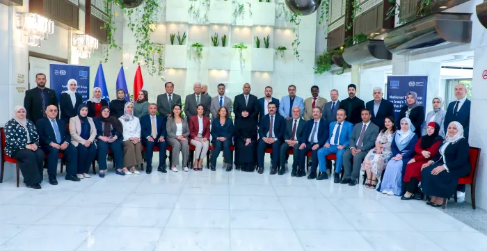 Participants pose for a group photo at the end of the first national workshop of the National Steering Committee for the Transition to the Formal Economy (Integrated Policies and Follow-up Mechanisms), Baghdad, 2 September 2026.