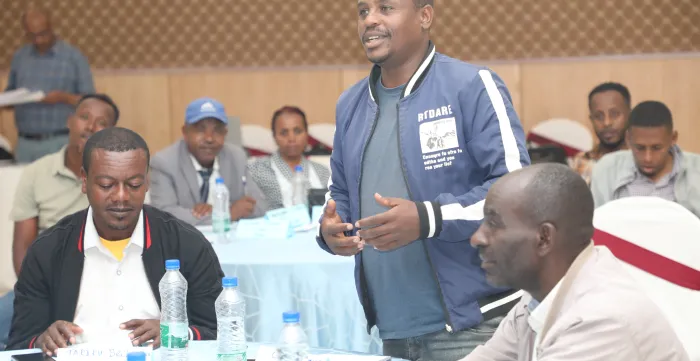 Participants actively participating in the discussion.