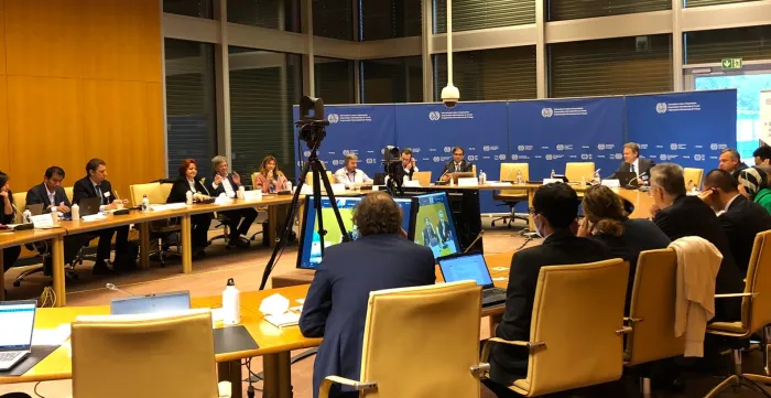 People sitting around a meeting table