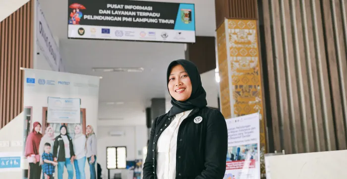 A representative of the Indonesian Migrant Workers Union stands inside the integrated migrant worker protection service centre in East Lampung.