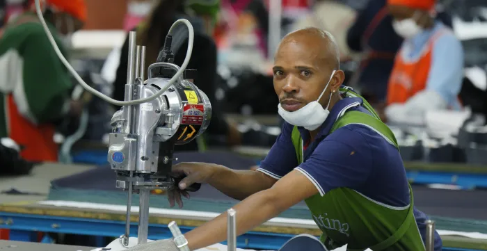 Operator is seen working in a garment factory in Lesotho