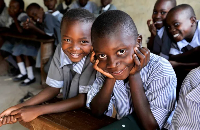 two children smiling at camera