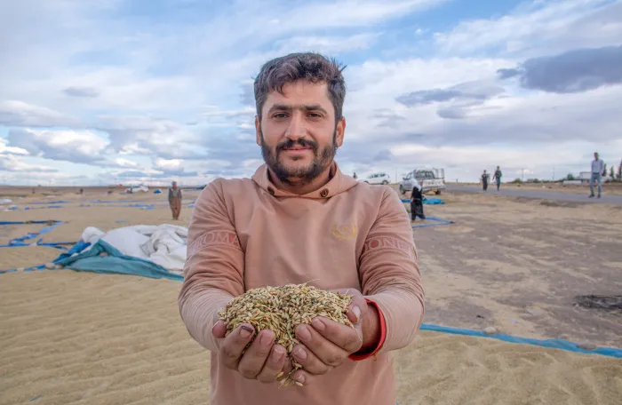farmer showing his produce