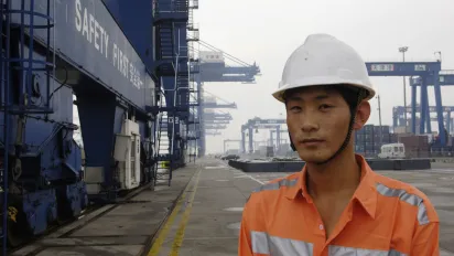 Employee at the Port Group Co. Company in charge of the exploitation of the port of Tianjin in China, considered as one of the twenty biggest ports in the world.