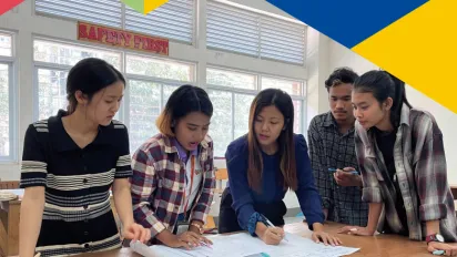 cover showcasing brainstorming students around a table