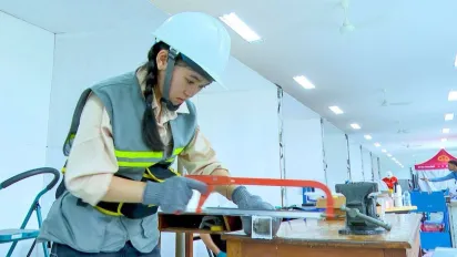 TVET trainee engages in practical lesson in TVET institute.