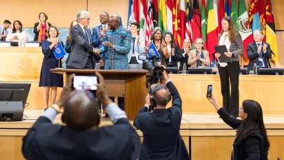 Applause during the closing ceremony of the 114th International Labour Conference as delegates celebrate the adoption of a new convention on decent work in the platform economy.