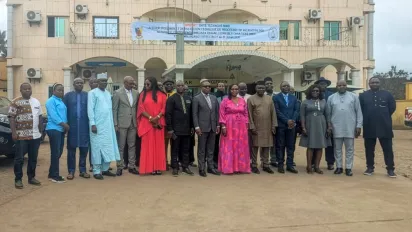 Workshop participants stand together for a group photo outside the venue hosting the technical review and validation workshop on the RPL framework in Ebolowa, Cameroon.