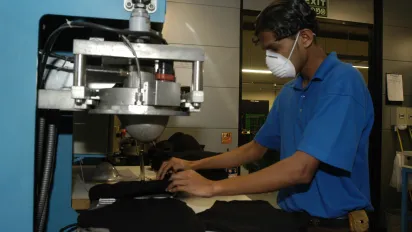 Sri Lankan worker in a fabric factory