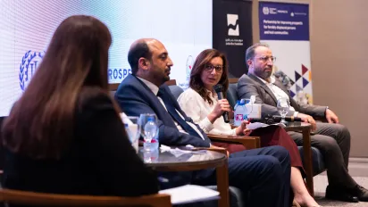 panel members at jordan event speaking from the podium
