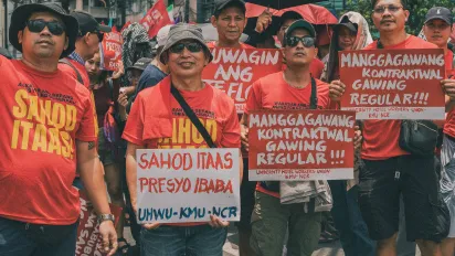Workers demonstrating for regular employment and higher wages in Manila.