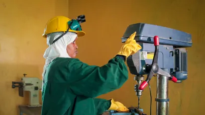 Female machine shop worker