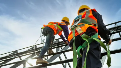 Safety in the construction sector - Workers wearing proper PPE