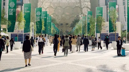 People walking to COP28 venue in Dubai, UAE