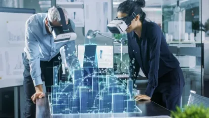 2 people wearing oculus rifts and staring at digital maps