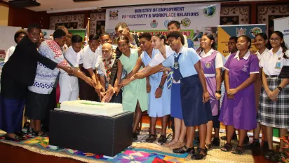 Cutting the cake to celebrate the launch of the Student Employment Exposure Program