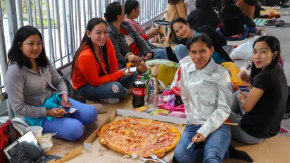 Domestic helpers from Indonesia and Philippines enjoying their day off on a Sunday in Hong Kong (China)