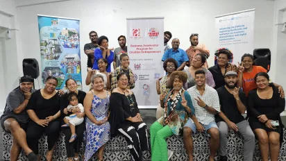 Training participants gather for a group photo