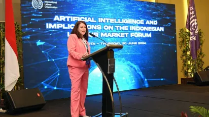 Celeste Drake, ILO Deputy Director-General, gives an opening remark at the High-Level AI Forum in Jakarta, Indonesia on 20 June. 