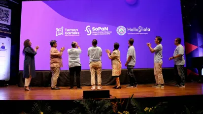Representatives of the ILO and three confederations and federations launch the grievance applications for garment workers.