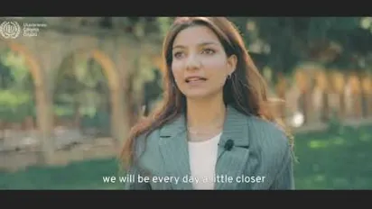A woman speaking to camera