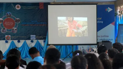 Participants of the commemoration of WDACL view a child labour video in Timor-Leste.