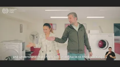 A woman and man use sign language in Turkiye