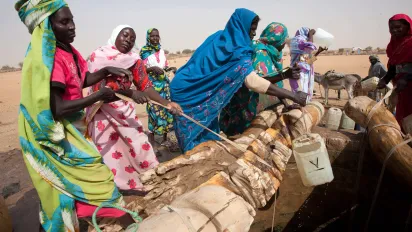 Women collecting water. North Darfur