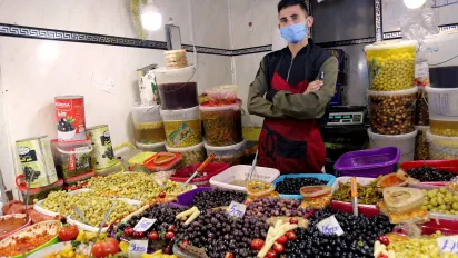 Fruit and vegetable seller during the COVID-19 crisis.Constantine, the town's covered market, Algeria.