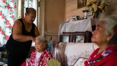 Siutiti, caregiver, brushing the hair of the elderly, Tonga
