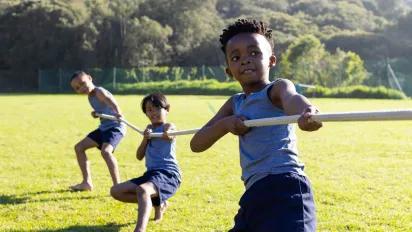 Children playing tug of war