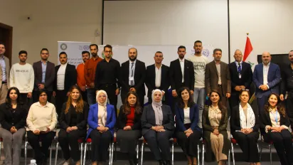 a group of people meeting During the 19th meeting of the National Committee for Pay Equity at the Jordanian National Commission for Women.