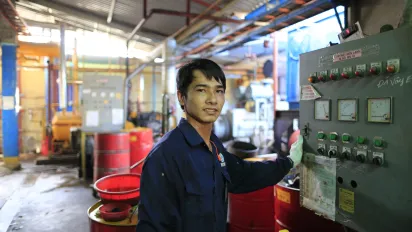 Vietnamese worker at a factory. Factory work is a common job for migrants in Japan 