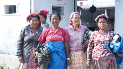 Group of women tea pluckers looking at the camera