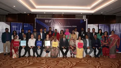 Secretary of the Ministry of Woman and Children Affairs with participants of the National Care Academy 