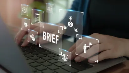 A person typing on a laptop with a digital overlay of project icons