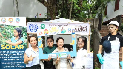Participants at the ILO booth. 