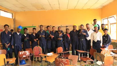 men at vocational training center wearing uniform