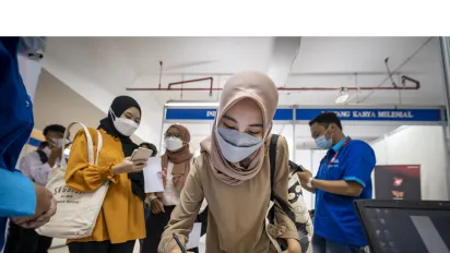 Job fair held in Jakarta. Young people enthusiastically lining up and applying for their dream job
